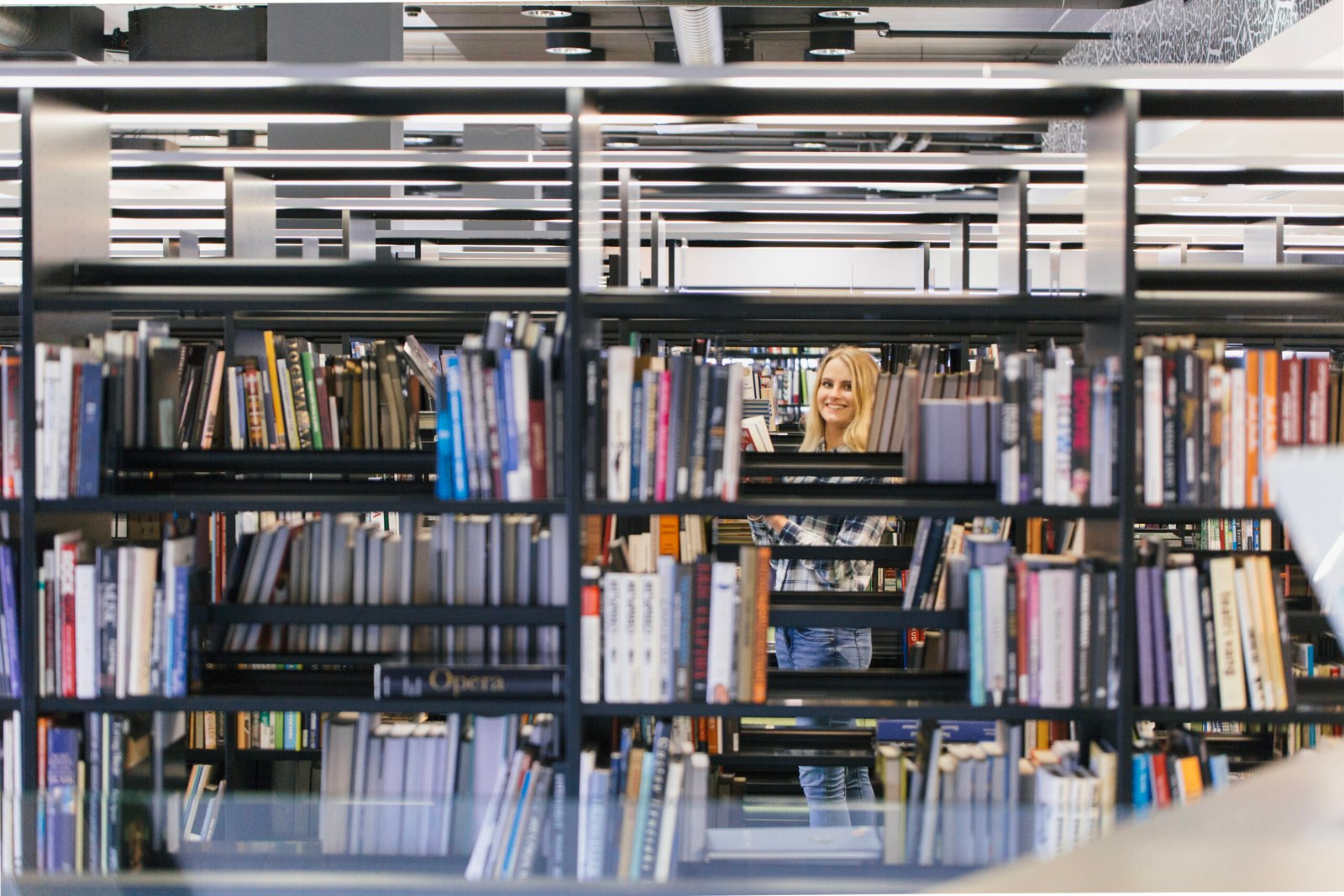 smiling-teen-girl-library-scaled